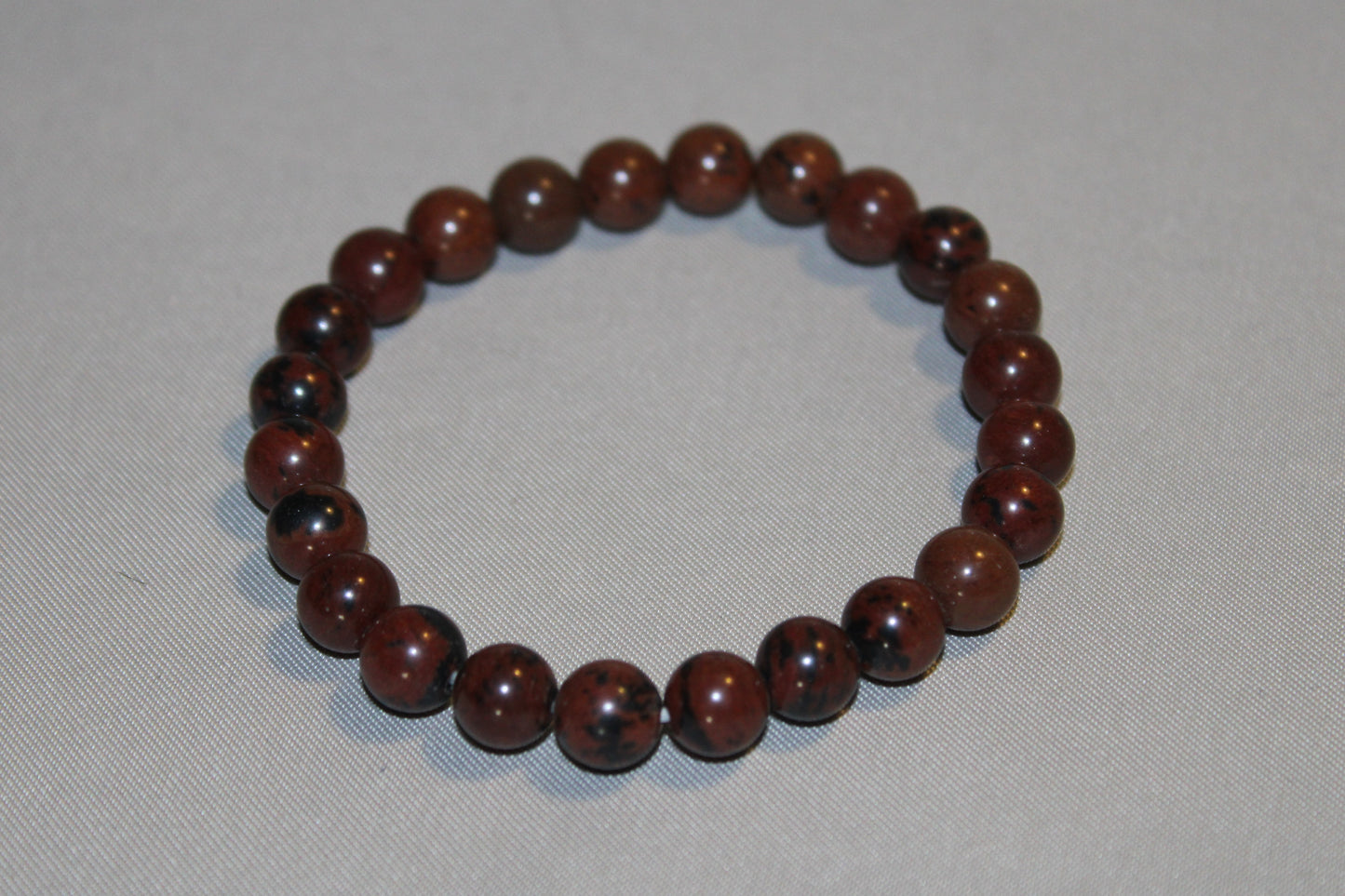 Mahogany Obsidian: A Volcanic Glass with Healing Properties for Emotional Balance and Stress Relief. Best for Scorpio and Sagittarius Zodiac Signs.