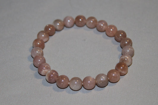 Peach Moonstone Healing Properties: Calming Energy, Emotional Balance, & Intuition Boost for Cancer Zodiac Sign. A Gentle Gemstone with Soothing Energy.